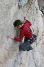 Me top rope climbing Diving for Rocks (5.10d), photographed from  the third bolt of Magster (5.10a) by Andrew Dreher.  It was another long day of rock climbing at Seismic Wall on Austin's Barton Creek Greenbelt, Saturday, April 11, 2009.

Filename: SRM_20090411_17072614.JPG
Aperture: f/5.6
Shutter Speed: 1/320
Body: Canon EOS-1D Mark II
Lens: Canon EF 16-35mm f/2.8 L