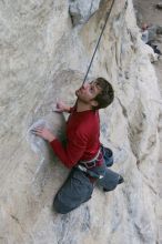 Me top rope climbing Diving for Rocks (5.10d), photographed from  the third bolt of Magster (5.10a) by Andrew Dreher.  It was another long day of rock climbing at Seismic Wall on Austin's Barton Creek Greenbelt, Saturday, April 11, 2009.

Filename: SRM_20090411_17073015.JPG
Aperture: f/5.6
Shutter Speed: 1/320
Body: Canon EOS-1D Mark II
Lens: Canon EF 16-35mm f/2.8 L