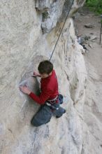 Me top rope climbing Diving for Rocks (5.10d), photographed from  the third bolt of Magster (5.10a) by Andrew Dreher.  It was another long day of rock climbing at Seismic Wall on Austin's Barton Creek Greenbelt, Saturday, April 11, 2009.

Filename: SRM_20090411_17073217.JPG
Aperture: f/5.6
Shutter Speed: 1/320
Body: Canon EOS-1D Mark II
Lens: Canon EF 16-35mm f/2.8 L