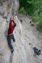 Me top rope climbing Diving for Rocks (5.10d) with Javier Morales belaying, photographed from  the third bolt of Magster (5.10a) by Andrew Dreher.  It was another long day of rock climbing at Seismic Wall on Austin's Barton Creek Greenbelt, Saturday, April 11, 2009.

Filename: SRM_20090411_17075319.JPG
Aperture: f/5.6
Shutter Speed: 1/320
Body: Canon EOS-1D Mark II
Lens: Canon EF 16-35mm f/2.8 L