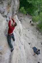 Me top rope climbing Diving for Rocks (5.10d) with Javier Morales belaying, photographed from  the third bolt of Magster (5.10a) by Andrew Dreher.  It was another long day of rock climbing at Seismic Wall on Austin's Barton Creek Greenbelt, Saturday, April 11, 2009.

Filename: SRM_20090411_17075421.JPG
Aperture: f/5.6
Shutter Speed: 1/320
Body: Canon EOS-1D Mark II
Lens: Canon EF 16-35mm f/2.8 L