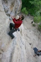 Me top rope climbing Diving for Rocks (5.10d) with Javier Morales belaying, photographed from  the third bolt of Magster (5.10a) by Andrew Dreher.  It was another long day of rock climbing at Seismic Wall on Austin's Barton Creek Greenbelt, Saturday, April 11, 2009.

Filename: SRM_20090411_17080725.JPG
Aperture: f/5.6
Shutter Speed: 1/320
Body: Canon EOS-1D Mark II
Lens: Canon EF 16-35mm f/2.8 L