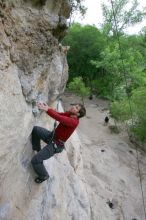 Me top rope climbing Diving for Rocks (5.10d), photographed from  the third bolt of Magster (5.10a) by Andrew Dreher.  It was another long day of rock climbing at Seismic Wall on Austin's Barton Creek Greenbelt, Saturday, April 11, 2009.

Filename: SRM_20090411_17080926.JPG
Aperture: f/5.6
Shutter Speed: 1/320
Body: Canon EOS-1D Mark II
Lens: Canon EF 16-35mm f/2.8 L