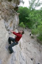 Me top rope climbing Diving for Rocks (5.10d), photographed from  the third bolt of Magster (5.10a) by Andrew Dreher.  It was another long day of rock climbing at Seismic Wall on Austin's Barton Creek Greenbelt, Saturday, April 11, 2009.

Filename: SRM_20090411_17080927.JPG
Aperture: f/5.6
Shutter Speed: 1/320
Body: Canon EOS-1D Mark II
Lens: Canon EF 16-35mm f/2.8 L