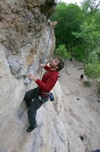 Me top rope climbing Diving for Rocks (5.10d), photographed from  the third bolt of Magster (5.10a) by Andrew Dreher.  It was another long day of rock climbing at Seismic Wall on Austin's Barton Creek Greenbelt, Saturday, April 11, 2009.

Filename: SRM_20090411_17081129.JPG
Aperture: f/5.6
Shutter Speed: 1/320
Body: Canon EOS-1D Mark II
Lens: Canon EF 16-35mm f/2.8 L