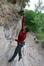 Me top rope climbing Diving for Rocks (5.10d), photographed from  the third bolt of Magster (5.10a) by Andrew Dreher.  It was another long day of rock climbing at Seismic Wall on Austin's Barton Creek Greenbelt, Saturday, April 11, 2009.

Filename: SRM_20090411_17081134.JPG
Aperture: f/5.6
Shutter Speed: 1/320
Body: Canon EOS-1D Mark II
Lens: Canon EF 16-35mm f/2.8 L