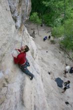 Me top rope climbing Diving for Rocks (5.10d) with Javier Morales belaying, photographed from  the third bolt of Magster (5.10a) by Andrew Dreher.  It was another long day of rock climbing at Seismic Wall on Austin's Barton Creek Greenbelt, Saturday, April 11, 2009.

Filename: SRM_20090411_17100542.JPG
Aperture: f/5.6
Shutter Speed: 1/320
Body: Canon EOS-1D Mark II
Lens: Canon EF 16-35mm f/2.8 L