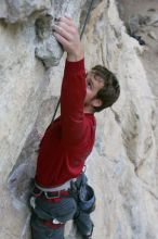 Me top rope climbing Diving for Rocks (5.10d), photographed from  the third bolt of Magster (5.10a) by Andrew Dreher.  It was another long day of rock climbing at Seismic Wall on Austin's Barton Creek Greenbelt, Saturday, April 11, 2009.

Filename: SRM_20090411_17101246.JPG
Aperture: f/5.6
Shutter Speed: 1/320
Body: Canon EOS-1D Mark II
Lens: Canon EF 16-35mm f/2.8 L