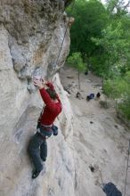 Me top rope climbing Diving for Rocks (5.10d), photographed from  the third bolt of Magster (5.10a) by Andrew Dreher.  It was another long day of rock climbing at Seismic Wall on Austin's Barton Creek Greenbelt, Saturday, April 11, 2009.

Filename: SRM_20090411_17102149.JPG
Aperture: f/5.6
Shutter Speed: 1/320
Body: Canon EOS-1D Mark II
Lens: Canon EF 16-35mm f/2.8 L