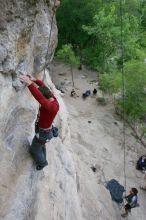 Me top rope climbing Diving for Rocks (5.10d) with Javier Morales belaying, photographed from  the third bolt of Magster (5.10a) by Andrew Dreher.  It was another long day of rock climbing at Seismic Wall on Austin's Barton Creek Greenbelt, Saturday, April 11, 2009.

Filename: SRM_20090411_17102350.JPG
Aperture: f/5.6
Shutter Speed: 1/320
Body: Canon EOS-1D Mark II
Lens: Canon EF 16-35mm f/2.8 L