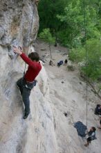 Me top rope climbing Diving for Rocks (5.10d) with Javier Morales belaying, photographed from  the third bolt of Magster (5.10a) by Andrew Dreher.  It was another long day of rock climbing at Seismic Wall on Austin's Barton Creek Greenbelt, Saturday, April 11, 2009.

Filename: SRM_20090411_17102651.JPG
Aperture: f/5.6
Shutter Speed: 1/320
Body: Canon EOS-1D Mark II
Lens: Canon EF 16-35mm f/2.8 L