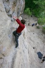 Me top rope climbing Diving for Rocks (5.10d), photographed from  the third bolt of Magster (5.10a) by Andrew Dreher.  It was another long day of rock climbing at Seismic Wall on Austin's Barton Creek Greenbelt, Saturday, April 11, 2009.

Filename: SRM_20090411_17102953.JPG
Aperture: f/5.6
Shutter Speed: 1/320
Body: Canon EOS-1D Mark II
Lens: Canon EF 16-35mm f/2.8 L