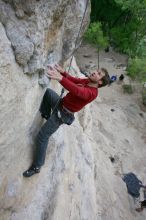 Me top rope climbing Diving for Rocks (5.10d), photographed from  the third bolt of Magster (5.10a) by Andrew Dreher.  It was another long day of rock climbing at Seismic Wall on Austin's Barton Creek Greenbelt, Saturday, April 11, 2009.

Filename: SRM_20090411_17103355.JPG
Aperture: f/5.6
Shutter Speed: 1/320
Body: Canon EOS-1D Mark II
Lens: Canon EF 16-35mm f/2.8 L