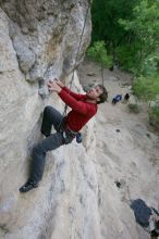 Me top rope climbing Diving for Rocks (5.10d), photographed from  the third bolt of Magster (5.10a) by Andrew Dreher.  It was another long day of rock climbing at Seismic Wall on Austin's Barton Creek Greenbelt, Saturday, April 11, 2009.

Filename: SRM_20090411_17103456.JPG
Aperture: f/5.6
Shutter Speed: 1/320
Body: Canon EOS-1D Mark II
Lens: Canon EF 16-35mm f/2.8 L