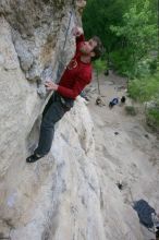 Me top rope climbing Diving for Rocks (5.10d), photographed from  the third bolt of Magster (5.10a) by Andrew Dreher.  It was another long day of rock climbing at Seismic Wall on Austin's Barton Creek Greenbelt, Saturday, April 11, 2009.

Filename: SRM_20090411_17103660.JPG
Aperture: f/5.6
Shutter Speed: 1/320
Body: Canon EOS-1D Mark II
Lens: Canon EF 16-35mm f/2.8 L