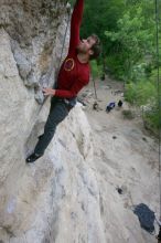 Me top rope climbing Diving for Rocks (5.10d), photographed from  the third bolt of Magster (5.10a) by Andrew Dreher.  It was another long day of rock climbing at Seismic Wall on Austin's Barton Creek Greenbelt, Saturday, April 11, 2009.

Filename: SRM_20090411_17103661.JPG
Aperture: f/5.6
Shutter Speed: 1/320
Body: Canon EOS-1D Mark II
Lens: Canon EF 16-35mm f/2.8 L