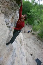 Me top rope climbing Diving for Rocks (5.10d), photographed from  the third bolt of Magster (5.10a) by Andrew Dreher.  It was another long day of rock climbing at Seismic Wall on Austin's Barton Creek Greenbelt, Saturday, April 11, 2009.

Filename: SRM_20090411_17103662.JPG
Aperture: f/5.6
Shutter Speed: 1/320
Body: Canon EOS-1D Mark II
Lens: Canon EF 16-35mm f/2.8 L