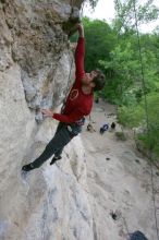 Me top rope climbing Diving for Rocks (5.10d), photographed from  the third bolt of Magster (5.10a) by Andrew Dreher.  It was another long day of rock climbing at Seismic Wall on Austin's Barton Creek Greenbelt, Saturday, April 11, 2009.

Filename: SRM_20090411_17103663.JPG
Aperture: f/5.6
Shutter Speed: 1/320
Body: Canon EOS-1D Mark II
Lens: Canon EF 16-35mm f/2.8 L