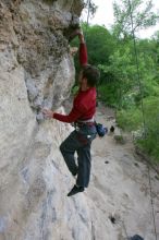 Me top rope climbing Diving for Rocks (5.10d), photographed from  the third bolt of Magster (5.10a) by Andrew Dreher.  It was another long day of rock climbing at Seismic Wall on Austin's Barton Creek Greenbelt, Saturday, April 11, 2009.

Filename: SRM_20090411_17103766.JPG
Aperture: f/5.6
Shutter Speed: 1/320
Body: Canon EOS-1D Mark II
Lens: Canon EF 16-35mm f/2.8 L