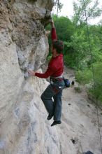 Me top rope climbing Diving for Rocks (5.10d), photographed from  the third bolt of Magster (5.10a) by Andrew Dreher.  It was another long day of rock climbing at Seismic Wall on Austin's Barton Creek Greenbelt, Saturday, April 11, 2009.

Filename: SRM_20090411_17103767.JPG
Aperture: f/5.6
Shutter Speed: 1/320
Body: Canon EOS-1D Mark II
Lens: Canon EF 16-35mm f/2.8 L