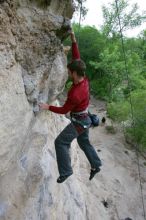 Me top rope climbing Diving for Rocks (5.10d), photographed from  the third bolt of Magster (5.10a) by Andrew Dreher.  It was another long day of rock climbing at Seismic Wall on Austin's Barton Creek Greenbelt, Saturday, April 11, 2009.

Filename: SRM_20090411_17103769.JPG
Aperture: f/5.6
Shutter Speed: 1/320
Body: Canon EOS-1D Mark II
Lens: Canon EF 16-35mm f/2.8 L