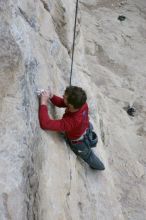 Me top rope climbing Diving for Rocks (5.10d), photographed from  the third bolt of Magster (5.10a) by Andrew Dreher.  It was another long day of rock climbing at Seismic Wall on Austin's Barton Creek Greenbelt, Saturday, April 11, 2009.

Filename: SRM_20090411_17115373.JPG
Aperture: f/5.6
Shutter Speed: 1/320
Body: Canon EOS-1D Mark II
Lens: Canon EF 16-35mm f/2.8 L