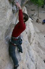 Me top rope climbing Diving for Rocks (5.10d), photographed from  the third bolt of Magster (5.10a) by Andrew Dreher.  It was another long day of rock climbing at Seismic Wall on Austin's Barton Creek Greenbelt, Saturday, April 11, 2009.

Filename: SRM_20090411_17124080.JPG
Aperture: f/5.6
Shutter Speed: 1/320
Body: Canon EOS-1D Mark II
Lens: Canon EF 16-35mm f/2.8 L