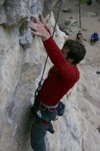 Me top rope climbing Diving for Rocks (5.10d), photographed from  the third bolt of Magster (5.10a) by Andrew Dreher.  It was another long day of rock climbing at Seismic Wall on Austin's Barton Creek Greenbelt, Saturday, April 11, 2009.

Filename: SRM_20090411_17124681.JPG
Aperture: f/5.6
Shutter Speed: 1/320
Body: Canon EOS-1D Mark II
Lens: Canon EF 16-35mm f/2.8 L