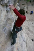 Me top rope climbing Diving for Rocks (5.10d), photographed from  the third bolt of Magster (5.10a) by Andrew Dreher.  It was another long day of rock climbing at Seismic Wall on Austin's Barton Creek Greenbelt, Saturday, April 11, 2009.

Filename: SRM_20090411_17125385.JPG
Aperture: f/5.6
Shutter Speed: 1/320
Body: Canon EOS-1D Mark II
Lens: Canon EF 16-35mm f/2.8 L