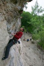 Me top rope climbing Diving for Rocks (5.10d), photographed from  the third bolt of Magster (5.10a) by Andrew Dreher.  It was another long day of rock climbing at Seismic Wall on Austin's Barton Creek Greenbelt, Saturday, April 11, 2009.

Filename: SRM_20090411_17125886.JPG
Aperture: f/5.6
Shutter Speed: 1/320
Body: Canon EOS-1D Mark II
Lens: Canon EF 16-35mm f/2.8 L