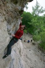 Me top rope climbing Diving for Rocks (5.10d), photographed from  the third bolt of Magster (5.10a) by Andrew Dreher.  It was another long day of rock climbing at Seismic Wall on Austin's Barton Creek Greenbelt, Saturday, April 11, 2009.

Filename: SRM_20090411_17125887.JPG
Aperture: f/5.6
Shutter Speed: 1/320
Body: Canon EOS-1D Mark II
Lens: Canon EF 16-35mm f/2.8 L