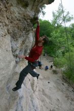 Me top rope climbing Diving for Rocks (5.10d), photographed from  the third bolt of Magster (5.10a) by Andrew Dreher.  It was another long day of rock climbing at Seismic Wall on Austin's Barton Creek Greenbelt, Saturday, April 11, 2009.

Filename: SRM_20090411_17125891.JPG
Aperture: f/5.6
Shutter Speed: 1/320
Body: Canon EOS-1D Mark II
Lens: Canon EF 16-35mm f/2.8 L