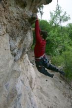 Me top rope climbing Diving for Rocks (5.10d), photographed from  the third bolt of Magster (5.10a) by Andrew Dreher.  It was another long day of rock climbing at Seismic Wall on Austin's Barton Creek Greenbelt, Saturday, April 11, 2009.

Filename: SRM_20090411_17125994.JPG
Aperture: f/5.6
Shutter Speed: 1/320
Body: Canon EOS-1D Mark II
Lens: Canon EF 16-35mm f/2.8 L