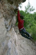 Me top rope climbing Diving for Rocks (5.10d), photographed from  the third bolt of Magster (5.10a) by Andrew Dreher.  It was another long day of rock climbing at Seismic Wall on Austin's Barton Creek Greenbelt, Saturday, April 11, 2009.

Filename: SRM_20090411_17125995.JPG
Aperture: f/5.6
Shutter Speed: 1/320
Body: Canon EOS-1D Mark II
Lens: Canon EF 16-35mm f/2.8 L