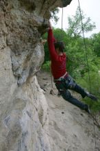 Me top rope climbing Diving for Rocks (5.10d), photographed from  the third bolt of Magster (5.10a) by Andrew Dreher.  It was another long day of rock climbing at Seismic Wall on Austin's Barton Creek Greenbelt, Saturday, April 11, 2009.

Filename: SRM_20090411_17125996.JPG
Aperture: f/5.6
Shutter Speed: 1/320
Body: Canon EOS-1D Mark II
Lens: Canon EF 16-35mm f/2.8 L