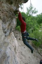 Me top rope climbing Diving for Rocks (5.10d), photographed from  the third bolt of Magster (5.10a) by Andrew Dreher.  It was another long day of rock climbing at Seismic Wall on Austin's Barton Creek Greenbelt, Saturday, April 11, 2009.

Filename: SRM_20090411_17125999.JPG
Aperture: f/5.6
Shutter Speed: 1/320
Body: Canon EOS-1D Mark II
Lens: Canon EF 16-35mm f/2.8 L