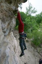 Me top rope climbing Diving for Rocks (5.10d), photographed from  the third bolt of Magster (5.10a) by Andrew Dreher.  It was another long day of rock climbing at Seismic Wall on Austin's Barton Creek Greenbelt, Saturday, April 11, 2009.

Filename: SRM_20090411_17130001.JPG
Aperture: f/5.6
Shutter Speed: 1/320
Body: Canon EOS-1D Mark II
Lens: Canon EF 16-35mm f/2.8 L