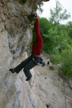 Me top rope climbing Diving for Rocks (5.10d), photographed from  the third bolt of Magster (5.10a) by Andrew Dreher.  It was another long day of rock climbing at Seismic Wall on Austin's Barton Creek Greenbelt, Saturday, April 11, 2009.

Filename: SRM_20090411_17130204.JPG
Aperture: f/5.6
Shutter Speed: 1/320
Body: Canon EOS-1D Mark II
Lens: Canon EF 16-35mm f/2.8 L