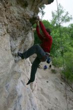 Me top rope climbing Diving for Rocks (5.10d), photographed from  the third bolt of Magster (5.10a) by Andrew Dreher.  It was another long day of rock climbing at Seismic Wall on Austin's Barton Creek Greenbelt, Saturday, April 11, 2009.

Filename: SRM_20090411_17130306.JPG
Aperture: f/5.6
Shutter Speed: 1/320
Body: Canon EOS-1D Mark II
Lens: Canon EF 16-35mm f/2.8 L