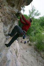 Me top rope climbing Diving for Rocks (5.10d), photographed from  the third bolt of Magster (5.10a) by Andrew Dreher.  It was another long day of rock climbing at Seismic Wall on Austin's Barton Creek Greenbelt, Saturday, April 11, 2009.

Filename: SRM_20090411_17130407.JPG
Aperture: f/5.6
Shutter Speed: 1/320
Body: Canon EOS-1D Mark II
Lens: Canon EF 16-35mm f/2.8 L