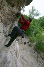 Me top rope climbing Diving for Rocks (5.10d), photographed from  the third bolt of Magster (5.10a) by Andrew Dreher.  It was another long day of rock climbing at Seismic Wall on Austin's Barton Creek Greenbelt, Saturday, April 11, 2009.

Filename: SRM_20090411_17130408.JPG
Aperture: f/5.6
Shutter Speed: 1/320
Body: Canon EOS-1D Mark II
Lens: Canon EF 16-35mm f/2.8 L