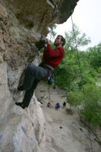 Me top rope climbing Diving for Rocks (5.10d), photographed from  the third bolt of Magster (5.10a) by Andrew Dreher.  It was another long day of rock climbing at Seismic Wall on Austin's Barton Creek Greenbelt, Saturday, April 11, 2009.

Filename: SRM_20090411_17130510.JPG
Aperture: f/5.6
Shutter Speed: 1/320
Body: Canon EOS-1D Mark II
Lens: Canon EF 16-35mm f/2.8 L