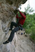 Me top rope climbing Diving for Rocks (5.10d), photographed from  the third bolt of Magster (5.10a) by Andrew Dreher.  It was another long day of rock climbing at Seismic Wall on Austin's Barton Creek Greenbelt, Saturday, April 11, 2009.

Filename: SRM_20090411_17131012.JPG
Aperture: f/5.6
Shutter Speed: 1/320
Body: Canon EOS-1D Mark II
Lens: Canon EF 16-35mm f/2.8 L