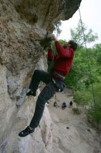 Me top rope climbing Diving for Rocks (5.10d), photographed from  the third bolt of Magster (5.10a) by Andrew Dreher.  It was another long day of rock climbing at Seismic Wall on Austin's Barton Creek Greenbelt, Saturday, April 11, 2009.

Filename: SRM_20090411_17131113.JPG
Aperture: f/5.6
Shutter Speed: 1/320
Body: Canon EOS-1D Mark II
Lens: Canon EF 16-35mm f/2.8 L