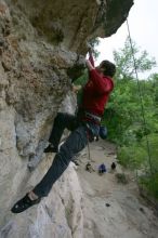 Me top rope climbing Diving for Rocks (5.10d), photographed from  the third bolt of Magster (5.10a) by Andrew Dreher.  It was another long day of rock climbing at Seismic Wall on Austin's Barton Creek Greenbelt, Saturday, April 11, 2009.

Filename: SRM_20090411_17131214.JPG
Aperture: f/5.6
Shutter Speed: 1/320
Body: Canon EOS-1D Mark II
Lens: Canon EF 16-35mm f/2.8 L