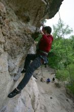 Me top rope climbing Diving for Rocks (5.10d), photographed from  the third bolt of Magster (5.10a) by Andrew Dreher.  It was another long day of rock climbing at Seismic Wall on Austin's Barton Creek Greenbelt, Saturday, April 11, 2009.

Filename: SRM_20090411_17131215.JPG
Aperture: f/5.6
Shutter Speed: 1/320
Body: Canon EOS-1D Mark II
Lens: Canon EF 16-35mm f/2.8 L