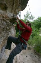 Me top rope climbing Diving for Rocks (5.10d), photographed from  the third bolt of Magster (5.10a) by Andrew Dreher.  It was another long day of rock climbing at Seismic Wall on Austin's Barton Creek Greenbelt, Saturday, April 11, 2009.

Filename: SRM_20090411_17132418.JPG
Aperture: f/5.6
Shutter Speed: 1/320
Body: Canon EOS-1D Mark II
Lens: Canon EF 16-35mm f/2.8 L