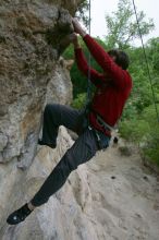 Me top rope climbing Diving for Rocks (5.10d), photographed from  the third bolt of Magster (5.10a) by Andrew Dreher.  It was another long day of rock climbing at Seismic Wall on Austin's Barton Creek Greenbelt, Saturday, April 11, 2009.

Filename: SRM_20090411_17132620.JPG
Aperture: f/5.6
Shutter Speed: 1/320
Body: Canon EOS-1D Mark II
Lens: Canon EF 16-35mm f/2.8 L