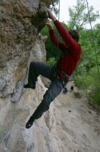 Me top rope climbing Diving for Rocks (5.10d), photographed from  the third bolt of Magster (5.10a) by Andrew Dreher.  It was another long day of rock climbing at Seismic Wall on Austin's Barton Creek Greenbelt, Saturday, April 11, 2009.

Filename: SRM_20090411_17132721.JPG
Aperture: f/5.6
Shutter Speed: 1/320
Body: Canon EOS-1D Mark II
Lens: Canon EF 16-35mm f/2.8 L