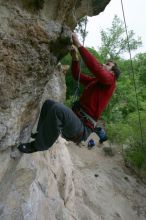 Me top rope climbing Diving for Rocks (5.10d), photographed from  the third bolt of Magster (5.10a) by Andrew Dreher.  It was another long day of rock climbing at Seismic Wall on Austin's Barton Creek Greenbelt, Saturday, April 11, 2009.

Filename: SRM_20090411_17132923.JPG
Aperture: f/5.6
Shutter Speed: 1/320
Body: Canon EOS-1D Mark II
Lens: Canon EF 16-35mm f/2.8 L